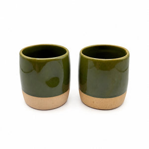 Two olive-green Cliffs thumbprint cups on a white background