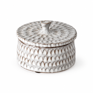 Gray ceramic trinket box with a textured surface and sculptural lid on a white background