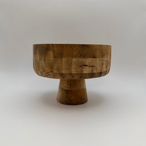 Wooden pedestal bowl with a wide rim, side view