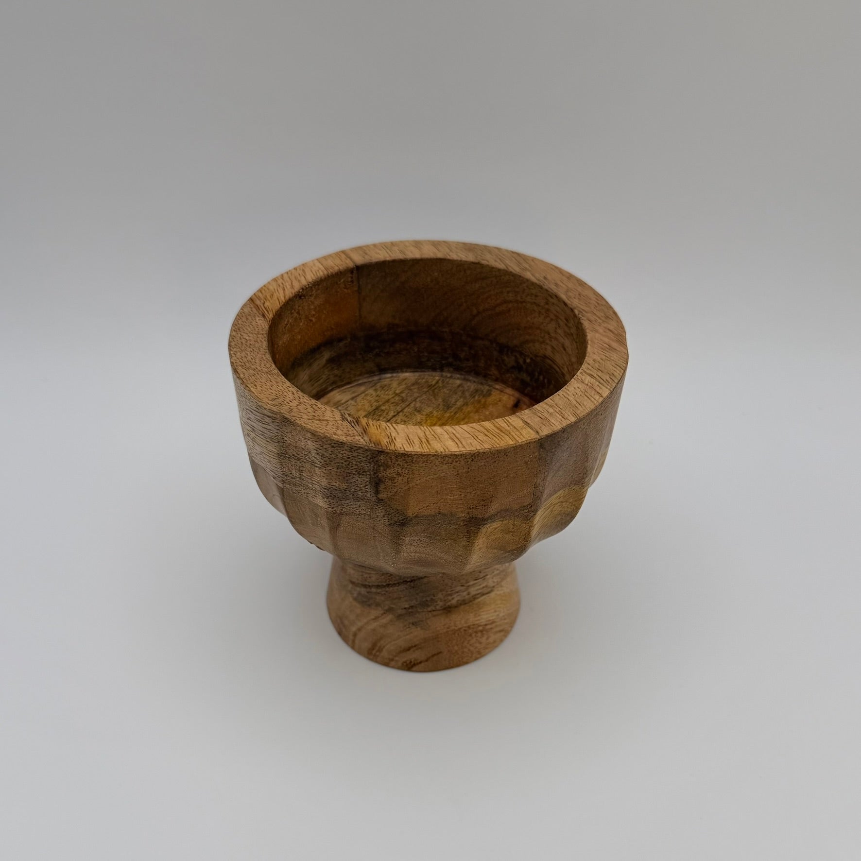 Solid wood pedestal bowl showing the interior and rounded rim