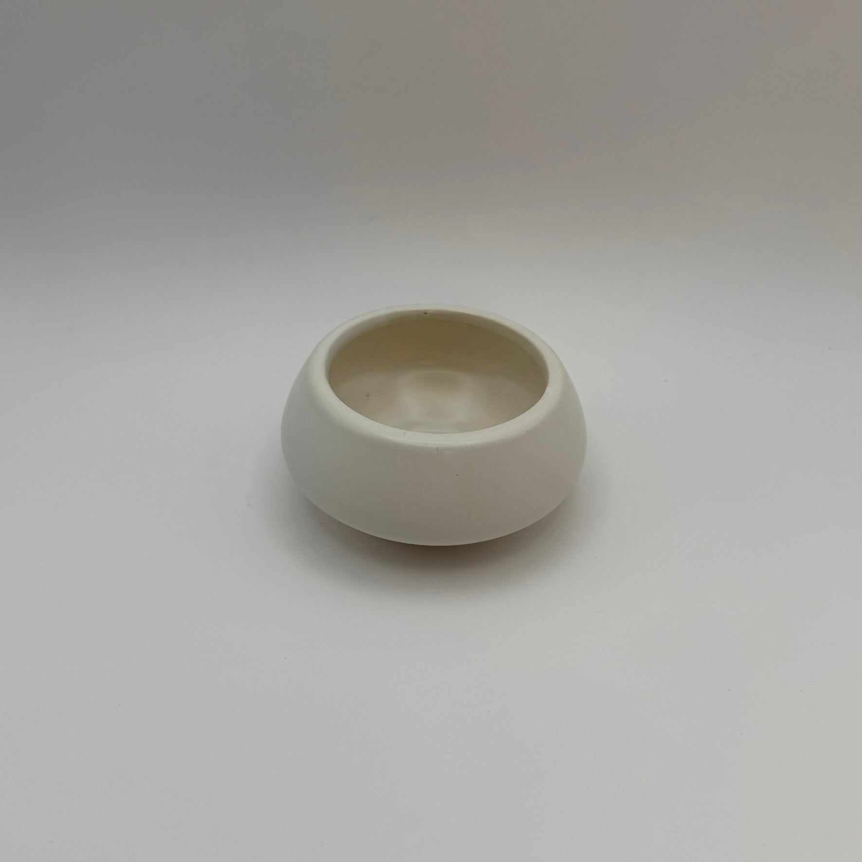 White ceramic decorative bowl viewed from above