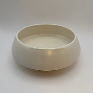 White low-profile ceramic bowl with a wide opening