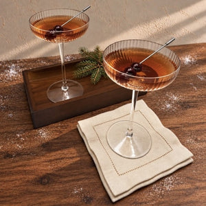 Cocktail Gift Set with two coupe glasses, wooden tray, cocktail picks and two linen napkins