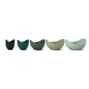Set of five Natalia stoneware bowls in graduated green shades arranged on a white background