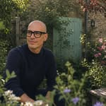 Vincent Clarke seated in his garden